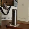 Taza Aislada de Titanio Puro de Gama Alta Ultraligera para Negocios, Taza de Bolsillo Portátil de Alto Valor, Taza de Té de Flor de Titanio de Cristal, Venta al por Mayor en Stock