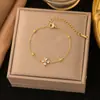 [Melhor Pulseira Estilo Quente 2] Temperamento Europeu e Americano High-End K Ouro Cruz Aço Titânio Pulseira Design Nicho Estilo Frio Mulheres