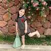Conjunto Novo Estilo Verão Roupas para Meninas Conjunto de Camiseta Listrada Top com Laço Shorts Manga Curta Infantil Simples Duas Peças