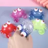 Brinquedo de Apertar para Alívio do Estresse de Caranguejo de Olhos Grandes, Feito de Borracha Macia TPR, com Contas Grandes, Maltose e Pó de Glitter