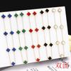 Collar de doble cara con trébol dorado y acero de titanio de estilo coreano, cadena de clavícula femenina, joyería en línea, suministro en vivo al por mayor