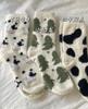 Calcetines Zhuji calcetines de felpa de visón para mujer calcetines cálidos para el piso calcetines de moda para el encierro