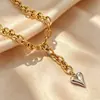 Collar de corazón de acero de titanio transfronterizo europeo y americano, gargantilla de moda y de alta gama, joyería de acero inoxidable chapada en oro que no se decolora al por mayor