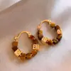 Pendientes Grandes Marrones Estilo Retro de Hong Kong para Mujer Pendientes de Alta Gama 2025 Nuevo Estilo Popular Pendientes de Aro Lisos