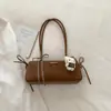 Bolsa de Axila Fashion Retrô para Mulheres 2026 Nova Tendência de Inverno Exquisite Versátil Bolsa Baguete Bolsa de Mão Bolsa de Ombro Atacado