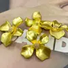 Nuevo Botón Metálico de Flor Asimétrica de Cuatro Pétalos Moda Botón para Abrigo Traje Chaqueta Accesorios para Ropa Hebilla Decorativa