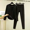 Novo conjunto de roupa íntima térmica feminina para outono e inverno: conjunto de duas peças: camiseta de manga longa com gola redonda e base em formato de arco, e calça longa justa e elástica