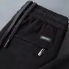 Liquidação Comércio exterior pedido original Manuseio de rejeitos Marca da moda Calças Esportivas Casuais Masculinas Retas Largas Calças de Moletom de Veludo