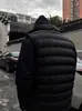 Chaleco de plumón negro ligero acanalado para hombre, adecuado para usar en capas en invierno, prenda exterior sin mangas, chaqueta de algodón con cuello alto
