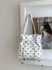 Bolso de mano tipo cubo versátil de lunares estilo coreano, estilo simple para el día a día, para mujer, alto atractivo estético, femenino, moderno, para llevar al hombro y cruzado