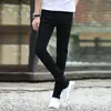 Calças Jeans Stretch Primavera e Outono Masculinas Slim Fit Skinny Casuais Retas Estilo Coreano Tendência Macacão Preto Resistente a Manchas