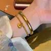 Pulsera Puzuo Qiang Protección de Color Oro Arena Gordita Fu Jin Tuo Tuo Año Nuevo Chino Zodiaco Cuerda Roja Pulsera Tejida a Mano para Mujer