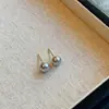 Pendientes de Perla de Pan de Color Gris Aurora de Gama Alta Personalidad Elegante Lujo Ligero Temperamento Retro Estilo Minimalista de Gama Alta