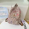 Mochila de Cuadros Estilo Graffiti de Nicho 2026 Nueva para Estudiantes de Secundaria y Preparatoria, Mochila de Lona de Gran Capacidad para Niñas