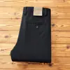 Nueva colección otoño e invierno 2026: forrados de polar, gruesos, texturizados, de sarga, elásticos, pantalones largos, de alta gama, corte holgado, pierna recta, pantalones casuales versátiles para hombre