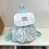 Mochila de tela a rayas de color fresco, estilo coreano, moderna y adecuada para estudiantes, uso diario, compras y salidas de primavera; una mochila escolar ligera