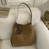 Bolso de Mano Mujer 2026 Japón Otoño Invierno Versátil Moda Tote Colgante Coreano Viaje Cruzado Perro Pequeño Estilo Nuevo Bolso de Hombro Simple