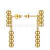Acero de titanio chapado en oro de 18 quilates Pendientes de botón metálicos pequeños de estilo europeo y americano con bola de acero móvil Pendientes de estilo de moda personalizados E211265