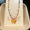 Nuevo Versátil de Perlas Colorido Dopamina Juguetón Contraste Dulce Verano Fresco Mariposa Collar Cadena de Clavícula Gargantilla