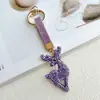 Pingente de chaveiro de Natal em argila com strass transfronteiriço com rena decorada com strass, árvore de Natal e bengala doce, chaveiro de pingente para bolsa