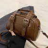 Bolsas de mano para mujer estilo coreano con textura de alta calidad, bolsos de hombro de diseño exclusivo, pequeños bolsos cuadrados casuales de moda al por mayor
