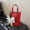 Bolsos Pequeños Populares Transfronterizos para Mujer Este Año, Verano 2025 Nuevo Bolso Bandolera Simple, Bolso de Cubo Portátil Estilo Coreano