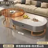 Mesa de centro em laje de rocha, sala de estar, uso doméstico, luxo leve, estilo moderno, minimalista, novo design, formato oval, popular entre influenciadores online, adequada para apartamentos pequenos