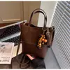 Bolsa Pequena Fosca Retro Transfronteiriça para Mulheres Outono e Inverno Versátil 2025 Nova Bolsa de Ombro Transversal Popular Estilo Quente Bolsa Saco