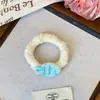 Linda Diadema de Pescado de Crema con Corazón Girly Banda para el Cabello de Tela Terciopelo Cuerda para el Cabello Simple Goma Elástica de Pescado Colorida Venta al por Mayor