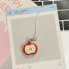 Novo pingente de corrente para celular maçã KT estampado em semicírculo DIY para carro pendurado all-match coração de menina joia semi-tridimensional