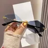 Gafas de Sol Cambia Color Moda Europea y Americana Modelo Nuevo 2026 Montura Metálica con Forma de Diamante Sin Marco para Mujer Anti-UV Marca Americana de Tendencia