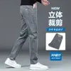 Fotos reales de jeans gruesos, elásticos, de corte ajustado, pierna recta para hombre para otoño e invierno, un pantalón largo casual moderno y versátil para hombres jóvenes