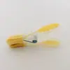 Clip de plástico de dos colores un paquete de 24 pinzas para secar a prueba de viento ropa fija a prueba de viento para el hogar