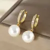 Pendientes colgantes de lujo de estilo europeo y americano con temperamento, incrustaciones de cobre, perla de circonio, pendientes retro elegantes para mujer, pendientes una generación de cabello