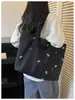 Bolsa de Ombro Único com Bordado de Laço 2026 Nova Outono/Inverno Grande Capacidade Bolsa Tote para Trabalho e Trajeto Bolsa de Braço da Moda para Mulheres