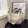 Bolsa transversal popular de tecido Oxford para mulheres deste ano, nova bolsa casual de ombro único para estudantes, aula, trajeto, bolsa bolinho 2026