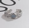 Anillo de Piedra Lunar Ola Irregular para Hombres y Mujeres con Anillo de Dedo Apilado Moda Sexual Viento Frío Anillo de Dedo Abierto
