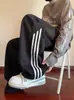 Calça Masculina Outono e Inverno Estilo Americano Listrada Solta Reta Masculina 2025 Nova Estudante Esportiva Casual Calça de Moletom