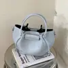 Bolso de Mujer de Gama Alta 2026 Nuevo de Moda Primavera Super Popular Pequeño Bolso Tote para el Trabajo Bolso Cruzado de Hombro Único Bolso Cubo