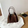 Bolso de Hombro de Gran Capacidad Estampado de Leopardo Lujo Ligero Nicho 2026 Cubo Nuevo Bolso de Mano para Mujer Bolso de Cuero Suave para Viajes Diarios
