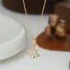 Corrente Elegante para Clavícula com Zircônia Microincrustada Eletrodepositada em Ouro Real para Mulheres, Design de Nicho Colar Borboleta de Concha Natural Corrente para Suéter