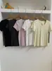 Camiseta de verano 2026 para mujer, manga corta con botón en la espalda, corte ajustado, serie de colores oxígeno claro, top para ir al trabajo, color macarrón, color liso