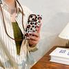 Funda personalizada para teléfono móvil iPhone15pro con estampado de leopardo marrón y negro resistente a caídas 14 Cordón cruzado ajustable para Apple 13