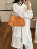 Bolsa feminina de design de nicho transfronteiriço de grande capacidade para ombro e axila 2026 nova bolsa feminina da moda bolsa de mão com padrão trançado