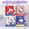 Caderno Espiral Classificação Gatinho Kt Vermelho e Azul Criativo Hello Kitty Adesivo Mágico A7 Caderno Planejador para Aluno do Ensino Fundamental