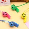 Venda quente apito de futebol de plástico brinquedos coloridos Copa do Mundo apito de árbitro de futebol apito sorridente adereços de torcida para crianças