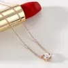 Venta al por mayor directa del fabricante: Collar Versátil de Acero de Titanio Estilo Coreano, Cadena para el Cuello Clavicular con un Solo Diamante en Oro Rosa para Comercio Exterior
