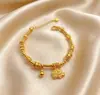 Pulsera Envolvente Elefantito Batido Hielo Triturado Moneda de Cobre Dorada Pulsera de Cuentas Planas Doradas Retención de Color Duradera Color Dorado Joyería de Mano Venta al por Mayor