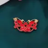 Colgante de Jade Imitación con Goteo de Aceite Chapado en Oro Pasador de Aleación Estilo Antiguo Colgante de Borla mecedora Paso Pendientes de Hoja Pequeña Colgante