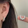 Brincos de metal espiral torcido de moda europeia e americana para mulheres, brincos únicos e de luxo leve de alta qualidade